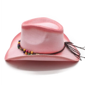 Pink western straw cowboy hat with colorful wooden beads and ethnic tassel band