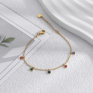 Gold titanium steel bracelet featuring five colorful bezel-set round zircon gemstones