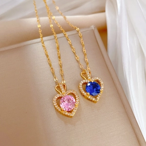 Luxury titanium steel heart necklaces with pink and blue gemstones on gold chains