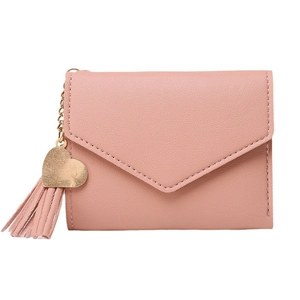 Pink faux leather tri-fold wallet for women with golden heart pendant and tassel