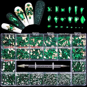 Macro detail of emerald nail crystal kit with 21 compartments and dual-ended wax pen