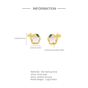 Detailed view of S925 silver flower stud earrings with white shell and green zirconia