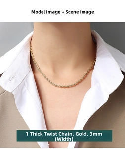 Detailed view of 3mm wide 18K gold plated titanium steel rope chain on a female model