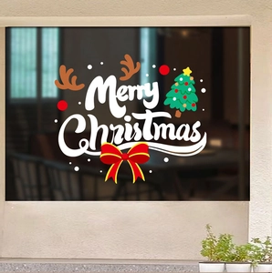Detail of Christmas window sticker with Merry Christmas text, green tree and red bow