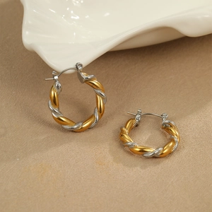 Two-tone twisted rope hoop earrings in 18k gold and silver finish for a trendy look