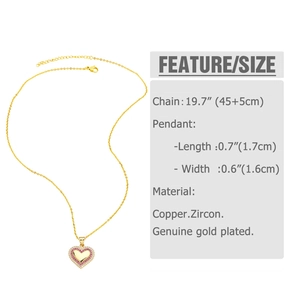 Detail view of heart pendant necklace featuring pink zircons and gold plated copper finish