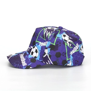 Detail view of children baseball cap with purple football pattern and football text
