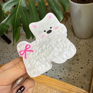 Cute Westie dog hair claw clip with pink bow made of pearlescent white acrylic material