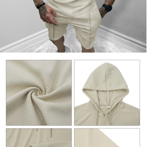 Detail view of men's beige waffle knit hooded set showing fabric texture and drawstring