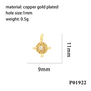 Mini copper gold plated cross charm with zircon inlay and detailed 9mm x 11mm dimensions