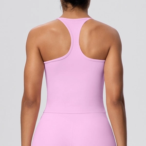 Pink racerback yoga tank top with thin straps and slim fit design for fitness training