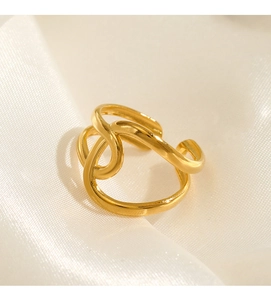 Detail of 18K gold plated stainless steel ring featuring irregular hollow line design
