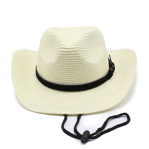 Detail of cream straw cowboy hat showing weave texture and adjustable wind rope
