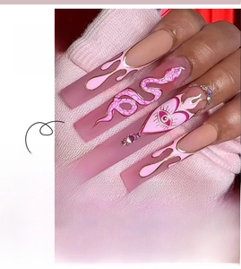 Matte pink French long coffin press-on nails with snake pattern and rhinestone details