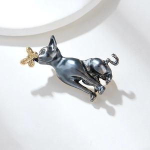 Running dark grey cat brooch with golden butterfly in mouth, made of zinc alloy