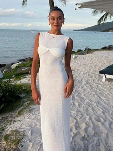 Elegant white sleeveless bodycon maxi dress with front knot detail for beach vacations