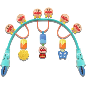 Detail of baby stroller clip toy featuring colorful hanging cartoon figures and flower charms