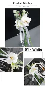 Detail of white artificial orchid with pearls and ribbon for wedding wine glass decor
