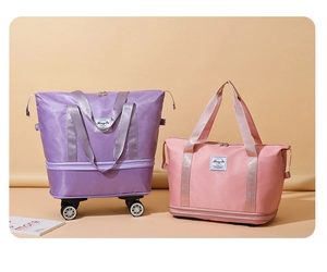 Detailed comparison of purple spinner wheel travel bag and pink expandable duffel bag