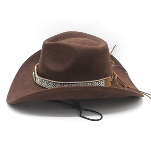 Detail of dark brown western cowboy hat with bohemian band and turquoise accent