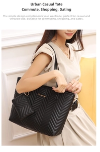 Detail of black wave quilted tote bag set with small pouch and gold logo accent
