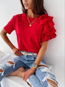 Detail view of red round neck T-shirt featuring stylish layered ruffle on the left shoulder