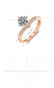 Detail view of heart shaped ring with 6.5mm main stone and 14 side crystals
