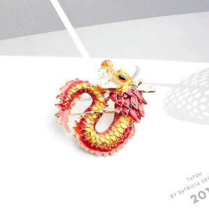 Golden dragon brooch with red and yellow enamel glaze detail for suits and fashion