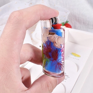 Macro detail of resin lighter case with dried flowers for Bic lighter storage