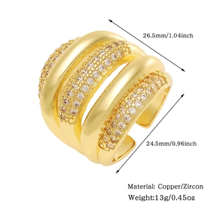 Detail of wide gold plated copper ring with shimmering zircon layers and size specs
