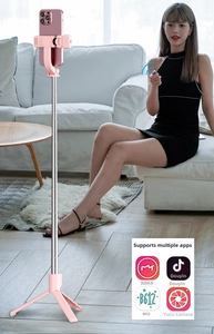 Pink multi-functional selfie stick tripod with telescopic rod and Bluetooth remote