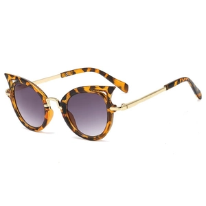 Fashionable tortoise cat-eye sunglasses for kids with gold metal temples and UV lenses