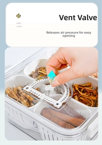Close-up of clear storage box lid with rotatable air valve and date tracker