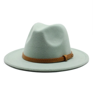 Detail showing mint green wool fedora with brown snakeskin pattern leather band and buckle