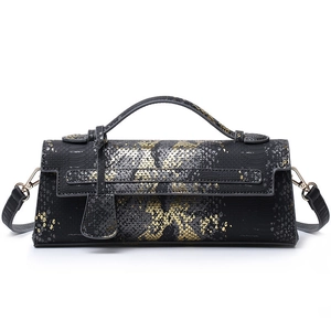 Elegant black and gold snake print baguette bag with handle and detachable strap