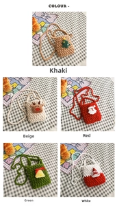 Close-up of assorted handmade crochet Christmas bags featuring reindeer and Santa designs