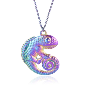 Macro shot of iridescent 18k gold plated lizard pendant with detailed scale textures