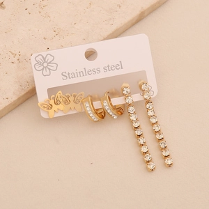 Three-piece gold stainless steel set with butterfly studs, crystal hoops and tassel earrings