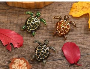 Detailed trio of vintage sea turtle brooches with enamel and sparkling rhinestones