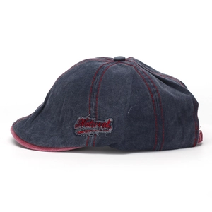 Detail of washed navy denim ivy cap with red Natural embroidery and contrast stitching