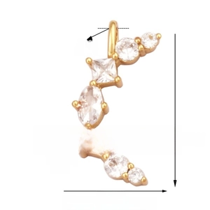 Macro view of gold S-curve pendant with clear cubic zirconia showing size 19x10mm