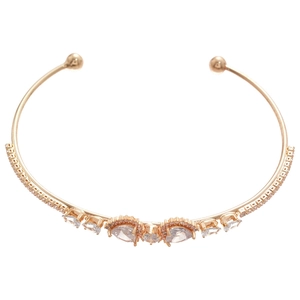 Luxurious open cuff bracelet with sparkling zircon hearts and teardrop stones in gold finish