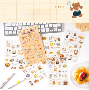 Macro shot of waterproof coffee and baking theme PET stickers for DIY scrapbooking decor