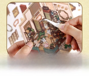 Close-up of DIY 3D miniature ancient scene stickers with tweezers assembling wood screen