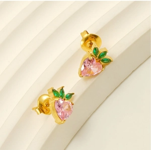 Detail of strawberry stud earrings with pink heart zircon and green leaf stones