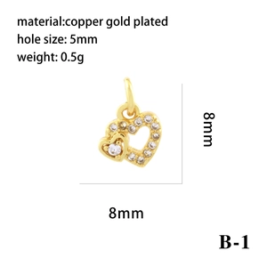 Detail of 18K gold plated heart pendant with pavé cubic zirconia and 5mm bail size