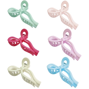 Large matte bow hair claws in six colors including mint, pink, and purple for women