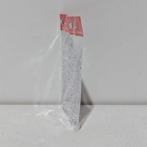 Detailed side view of 12pcs clear acrylic icicle ornaments in Christmas packaging