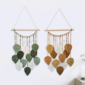 Suspension murale bohème tissée main avec feuilles et bois pour décoration intérieure