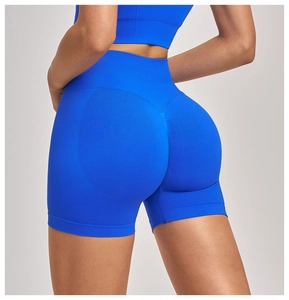 Detail of high waisted seamless yoga shorts with scrunch butt lift in bright cobalt blue